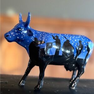 Jazzy Cow" figurine, which is part of the CowParade collection